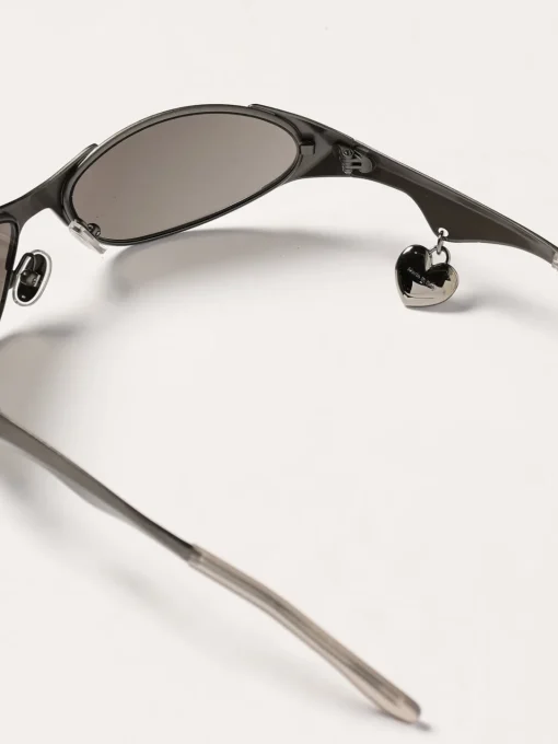 Occhiali da sole Acne Studios in acciaio con charm cuore