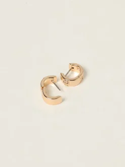 Orecchini Tory Burch in ottone