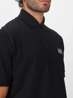 Polo in cotone con logo metallico Dolce & Gabbana