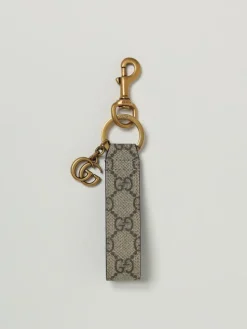 Portachiavi GG Gucci in ottone e tessuto GG Supreme