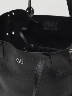 Borsa Nellcôte Valentino Garavani in pelle martellata con borchie ed occhielli