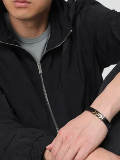 Bracciale Opyum Saint Laurent in pelle ed ottone