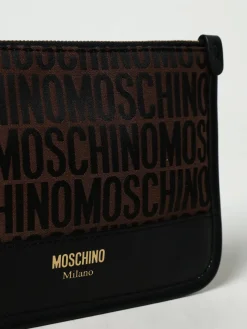 Clutch Moschino Couture in pelle e tessuto jacquard