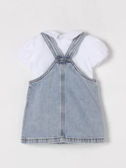 Coordinato in denim con toppe Teddy Moschino