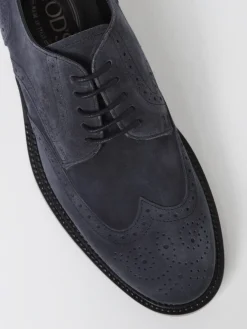 Derby Tod's in camoscio con motivo brogue