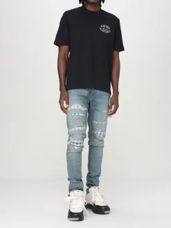 Jeans Amiri in denim distressed