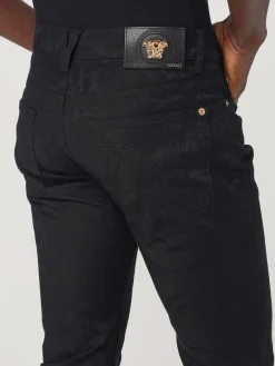 Jeans Versace in denim stampato