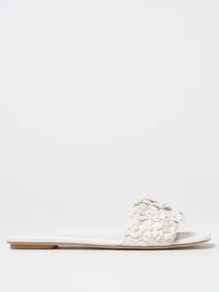 Mules Stuart Weitzman in pelle con fiori applicati