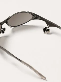 Occhiali da sole Acne Studios in acciaio con charm cuore