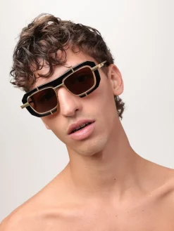 Occhiali da sole JW Anderson in metallo ed acetato