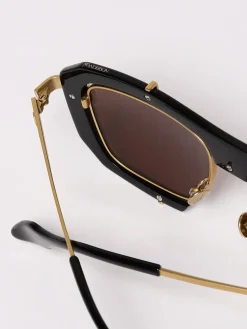 Occhiali da sole JW Anderson in metallo ed acetato