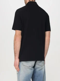 Polo in cotone con logo Balmain