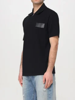 Polo in cotone con logo Balmain