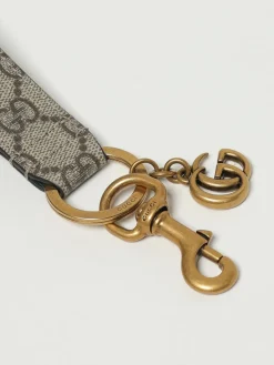 Portachiavi GG Gucci in ottone e tessuto GG Supreme