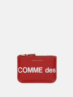 Portamonete Comme Des Garçons in pelle con stampa logo