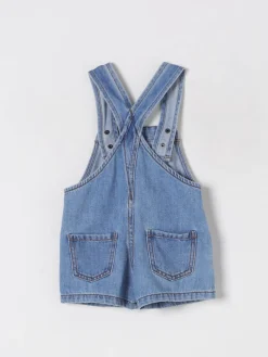 Salopette di jeans con Teddy Moschino