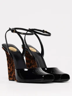 Sandalo Le Scandale Saint Laurent in vernice con zeppa in cavallino animalier