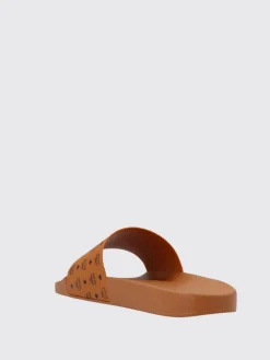 Sliders Mcm in cotone spalmato con logo all over