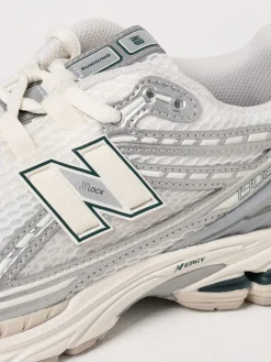 Sneakers M1906 New Balance in mesh e pelle sintetica laminata